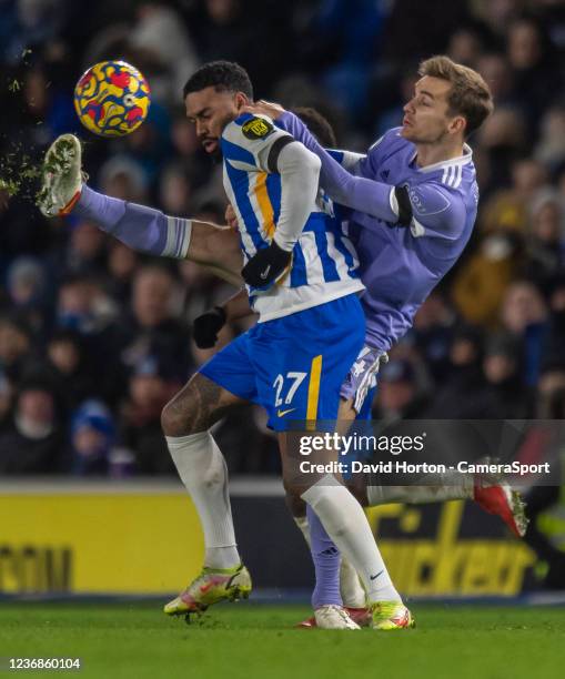 Leeds United's Diego Llorente battles for possession with Brighton & Hove Albion's Jurgen Locadia during the Premier League match between Brighton &...