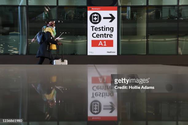 Covid testing centre sign at Heathrow Terminal 2 on November 28, 2021 in London, England. Following the discovery of a new Covid-19 variant, whose...