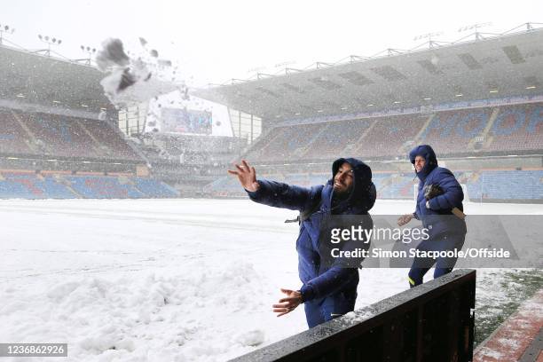 Lucas Moura of Tottenham Hotspur throws a snowball following the announcement that the match is being abandoned prior to the Premier League match...