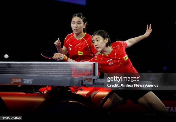 Chen Meng R/Qian Tianyi of China compete during the women's doubles quarterfinal match against Choi Hyojoo/Lee Zion of South Korea at 2021 World...