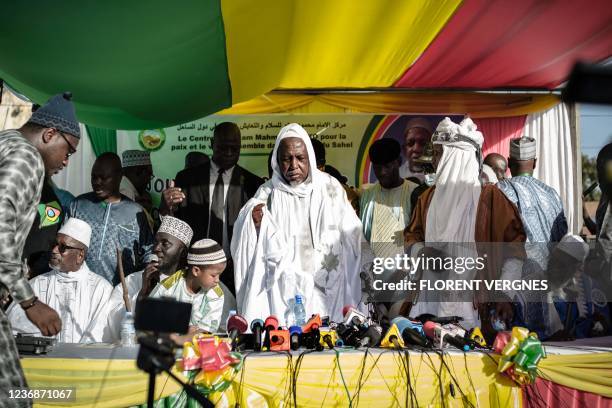 Malian influential imam Mahmoud Dicko stands during a public meeting in a rare public appearance in Bamako on November 28, 2021. - An influential...