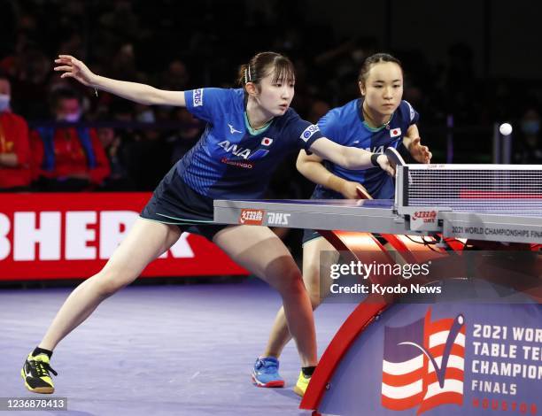 Japan's Hina Hayata and Mima Ito play against China's Qian Tianyi and Chen Meng in the women's doubles semifinals at the world table tennis...
