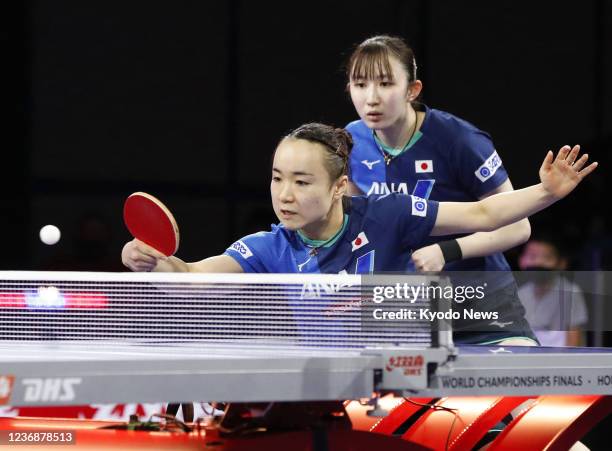 Japan's Mima Ito and Hina Hayata play against China's Qian Tianyi and Chen Meng in the women's doubles semifinals at the world table tennis...