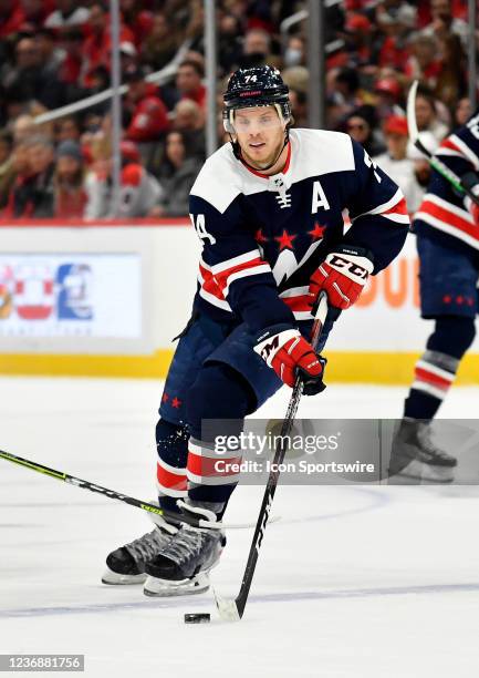 Capitals defenseman John Carlson stickhandles during the Florida Panthers versus Washington Capitals National Hockey League game on November 26, 2021...