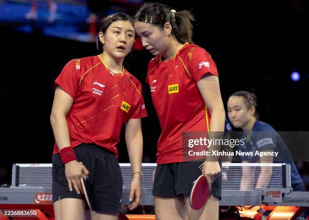 China's Chen Meng L/Qian Tianyi C compete during the women's doubles semifinal match against Japan's Ito Mima/Hayata Hina at 2021 World Table Tennis...