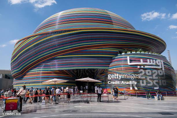 People walk by the Russia Pavilion at Dubai EXPO 2020 on November 29, 2021 in Dubai, United Arab Emirates.