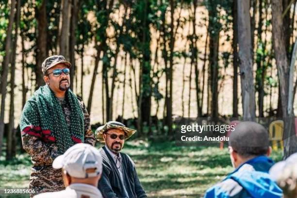 Ethiopia's Prime Minister Abiy Ahmed speaks during a meeting with soldiers as he joins the battlefront against rebel groups for the second time in...
