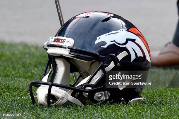 Denver Broncos helmet sits on the sideline during the NFL game between the Los Angeles Chargers and the Denver Broncos on November 28 at Empower...
