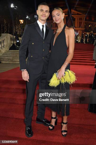 Romeo Beckham and Mia Regan arrive at The Fashion Awards 2021 at Royal Albert Hall on November 29, 2021 in London, England.