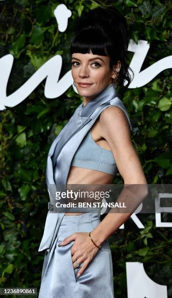 English singer-songwriter Lily Allen poses on the red carpet upon arrival at The Fashion Awards 2021 in London on November 29, 2021. - The Fashion...