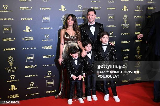 Paris Saint-Germain's Argentine forward Lionel Messi , his wife Antonella Roccuzzo , and their children Ciro, Mateo and Thiago pose upon arrival to...