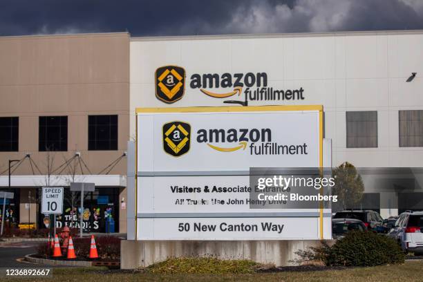 Signage outside an Amazon fulfillment center on Cyber Monday in Robbinsville, New Jersey, U.S., on Monday, Nov. 29, 2021. Adobe Digital Economy Index...