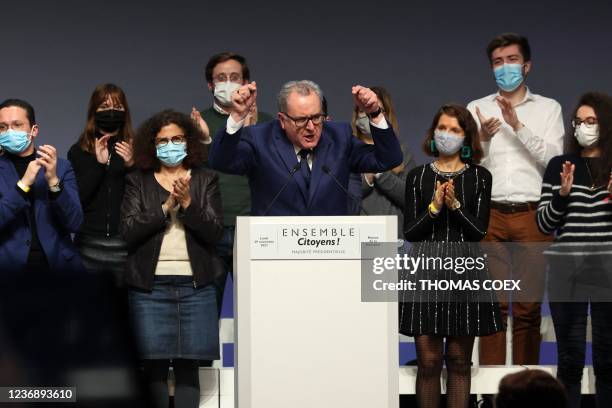 French National Assembly president Richard Ferrand gestures as he speaks during the launching meeting of the presidential majority called "Ensemble...