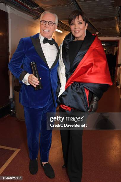 Tommy Hilfiger, winner of the Outstanding Achievement Award, and Kris Jenner pose backstage at The Fashion Awards 2021 at Royal Albert Hall on...