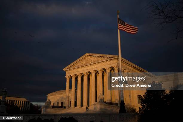 View of the U.S. Supreme Court at sunset on November 29, 2021 in Washington, DC. On Wednesday, the Supreme Court will hear a case concerning a...