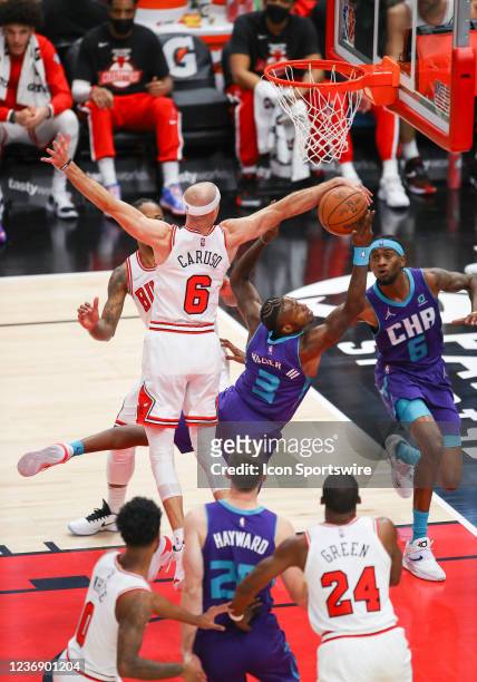 Chicago Bulls Forward Alex Caruso blocks Charlotte Hornets Guard Terry Rozier shot during a NBA game between the Charlotte Hornets and the Chicago...