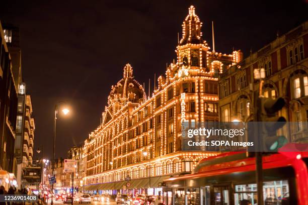 Harrods outshines the surrounding building with its facade lighting.