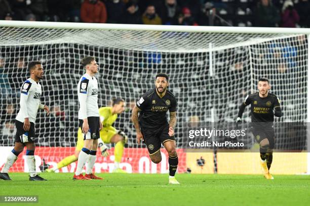 Andre Gray of Queens Park Rangers celebrates after scoring a goal to make it 1-2 during the Sky Bet Championship match between Derby County and...