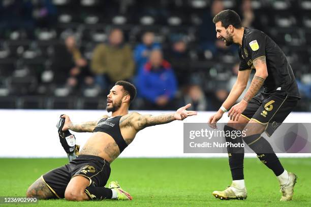 Andre Gray of Queens Park Rangers celebrates after scoring a goal to make it 1-2 during the Sky Bet Championship match between Derby County and...