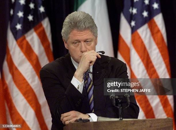 President Bill Clinton pauses a moment while being asked about former White House intern Monica Lewinsky at a joint press conference with Italian...