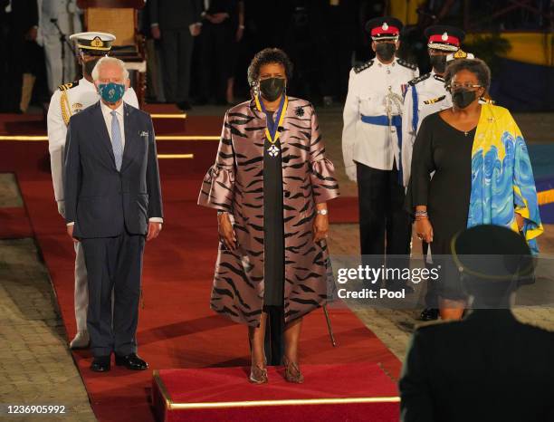 Prince Charles Prince of Wales is joined by President of Barbados Sandra Mason, and Prime Minister of Barbados Mia Mottley as they prepare to depart...
