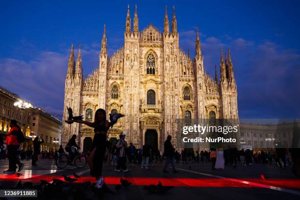 An evening view of Duomo Cathedral and Piazza del Duomo in Milan, Italy on October 6, 2021.