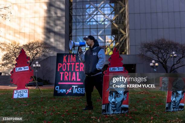 Community member speaks outside Hennepin County Government Center in Minneapolis, Minnesota on November 30, 2021. - Jury selection begins today in...
