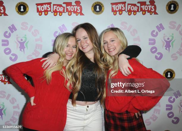 Katie Couch, Mackenzie Couch and Kameron Couch attend The Couch Sisters 3rd Annual Toys For Tots Toy Drive held at Fountain Valley Skating Rink on...