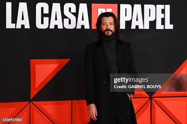 Spanish actor Alvaro Morte poses during a photocall for the presentation of the last part of the fifth season of the Spanish TV show "Money Heist" at...