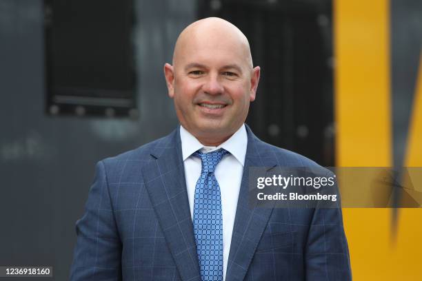 Mark Buncher, president and chief executive officer of Siemens Mobility Inc. For North America, in front of a new test train built for VIA Rail...