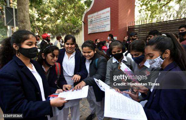 Students outside an examination centre after appearing in the CBSE 10th Social Science Theory Board Exams 2022 for Term-1, at Kerala school on...