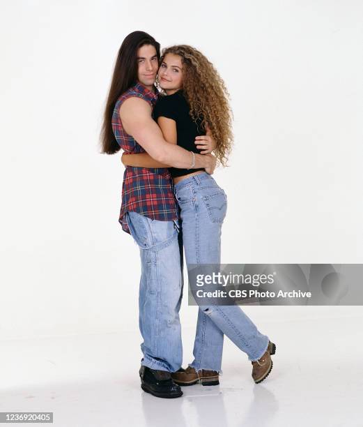 Cast members Phil Buckman and Keri Russell . Series premiere date, September 21, 1994.