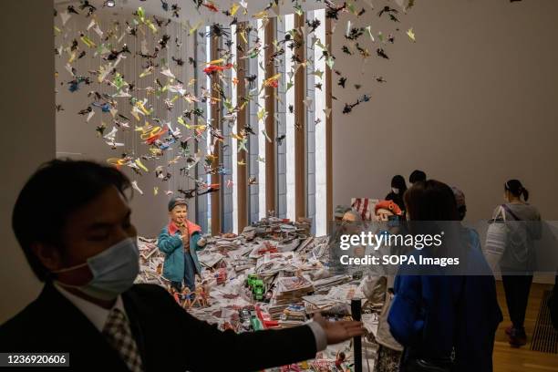 Visitors view the artwork "Stratégie en Chambre" by Wang Du at the newly opened M+ museum. The M+ museum, one of the largest museums of modern and...