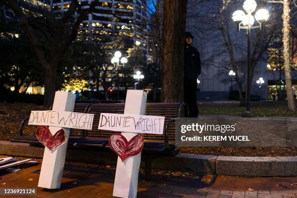 Crosses bearing the name of Daunte Wright and a heart are displayed outside the Hennepin County Government Center on November 30, 2021 in...