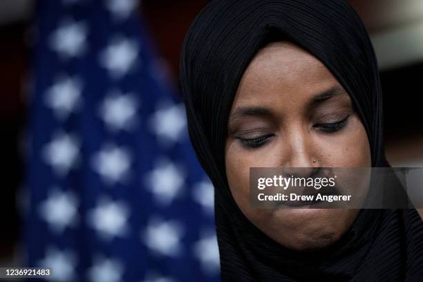 Rep. Ilhan Omar pauses during a news conference about Islamophobia on Capitol Hill on November 30, 2021 in Washington, DC. A video of Rep. Lauren...