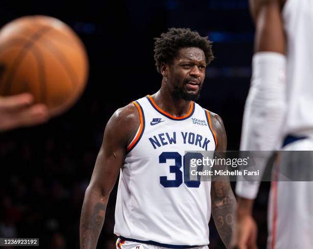 Julius Randle of the New York Knicks reacts during the game against the Brooklyn Nets at Barclays Center on November 30, 2021 in the Brooklyn borough...