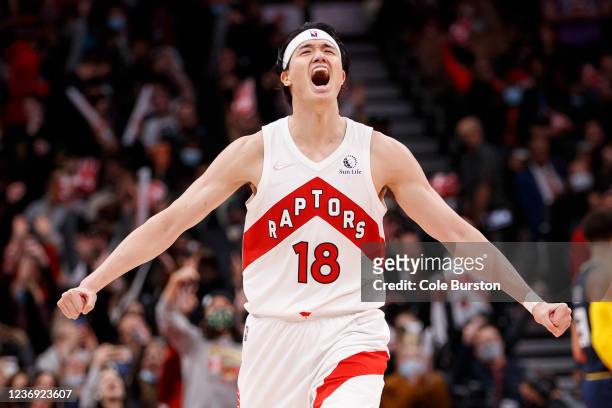 Yuta Watanabe of the Toronto Raptors celebrates a 3-pointer during the second half of their NBA game against the Memphis Grizzlies at Scotiabank...