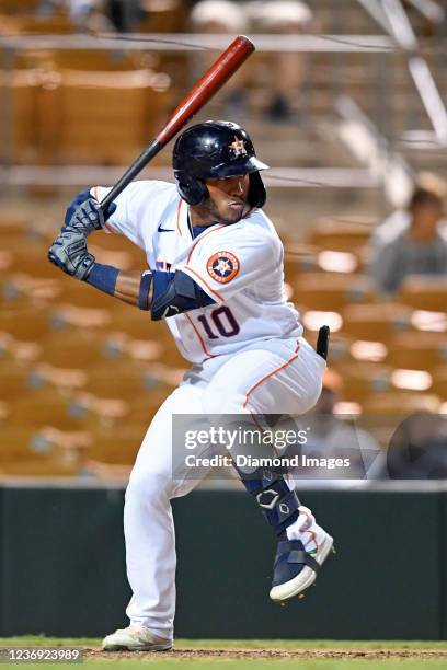 Pedro Leon of the Glendale Desert Dogs bats against the Mesa Solar Sox at Camelback Ranch on November 10, 2021 in Glendale, Arizona.