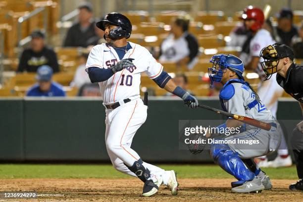 Pedro Leon of the Glendale Desert Dogs bats against the Mesa Solar Sox at Camelback Ranch on November 10, 2021 in Glendale, Arizona.