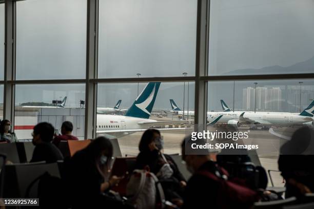 Cathay Pacific planes seen on ground at Hong Kong International Airport. The Hong Kong International Airport during COVID-19 pandemic.