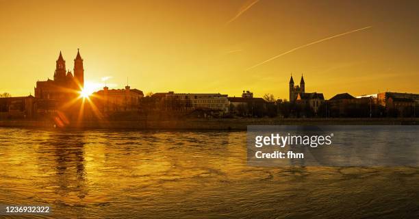 magdeburg sunset skyline panorama (saxony-anhalt, germany) - magdeburg stock pictures, royalty-free photos & images