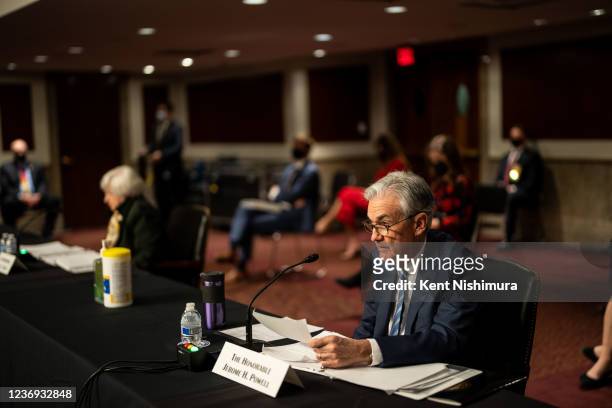 Federal Reserve Chair Jerome Powell testifies before a Senate Banking Committee hearing on the CARES Act Oversight at the Senate Office Building on...