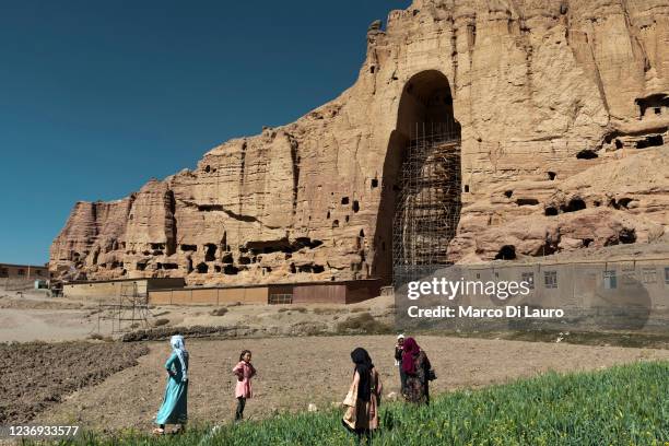 Afghan tourists from Kabul visit the site that housed the famous Buddhas on October 6, 2021 in Bamiyan, Afghanistan. Since the Taliban retook control...