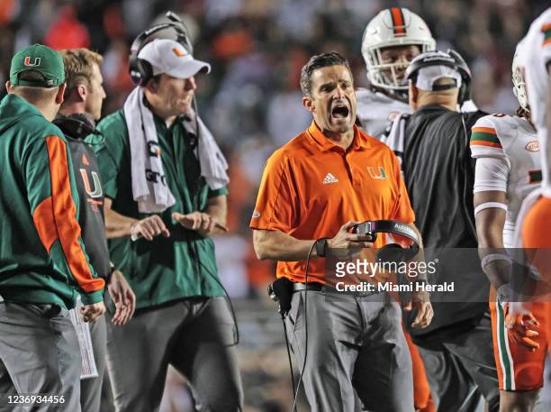 Miami head coach Manny Diaz hollers from the sidelines during action against Florida State at Doak Campbell Stadium in Tallahassee, Florida, on...