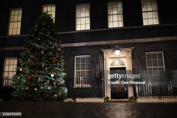 Christmas tree stands illuminated outside number 10 Downing Street after British Prime Minister Boris Johnson hosted an event to switch on the lights...