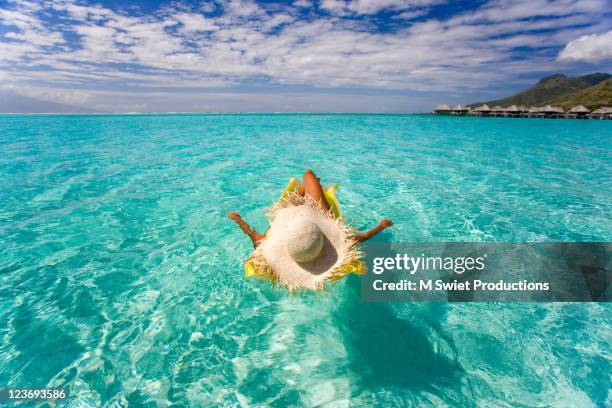 floating - tahiti stock pictures, royalty-free photos & images
