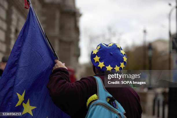 An activist seen holding an European Flag during the demonstration. Protesters from the group of Sodem Action lead by Pro EU activist Steve Bray...