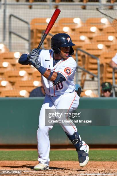 Pedro Leon of the Glendale Desert Dogs bats against the Surprise Saguaros at Camelback Ranch on November 11, 2021 in Glendale, Arizona.