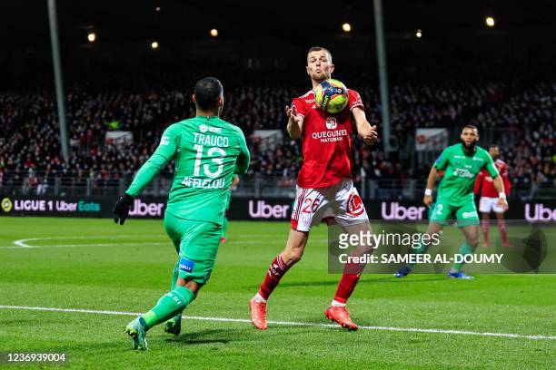 Brest's French midfielder Jeremy Le Douaron controls the ball in front of Saint-Etienne's Peruvian defender Miguel Trauco during the French L1...