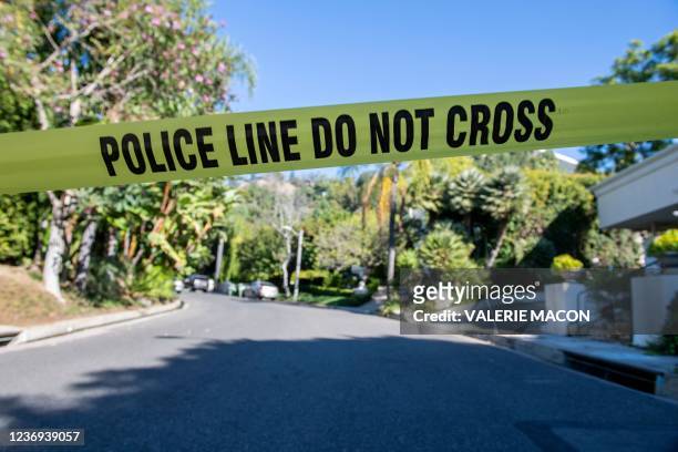 Yellow Police tape blocks access to the 1100 block of Maytor place where Jacqueline Avant's house is at the top of the hill, in Beverly Hills ,...
